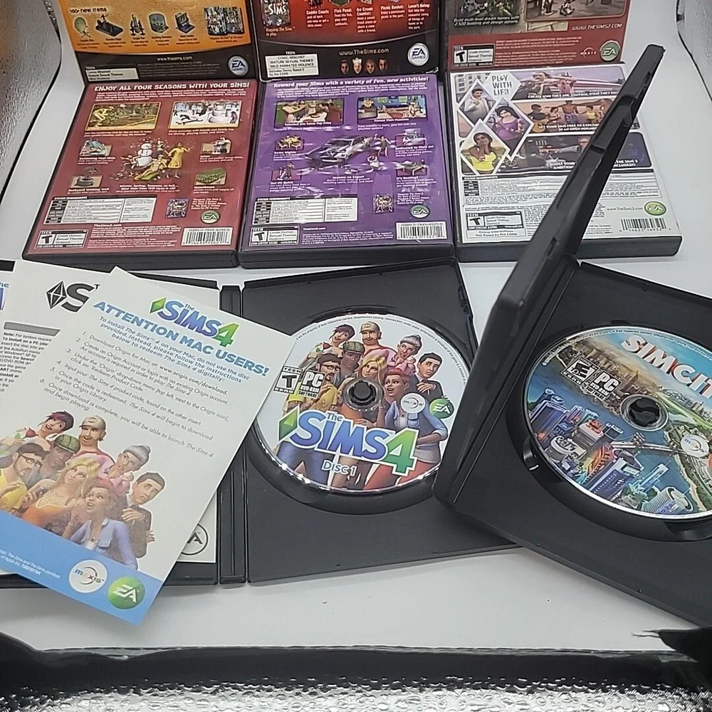The Sims Lot of 13‎ PC Games and Expansion Packs